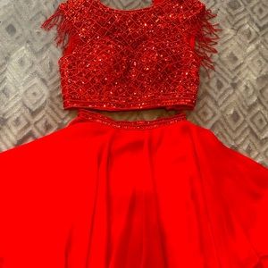 Selling two piece red homecoming dress.